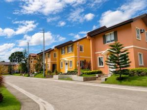 a row of houses on the side of a road at Jorich home stay in Dumaguete