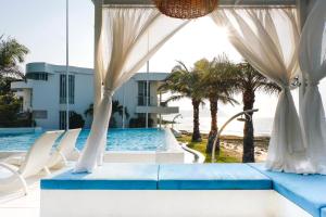 a view from the pool at a resort at Pure Sunset Beach - By Mikihollick in Na Jomtien