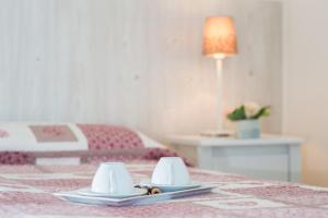 A bed or beds in a room at La Casa di Linda