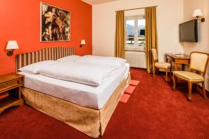 Postel nebo postele na pokoji v ubytování Hotel Traube