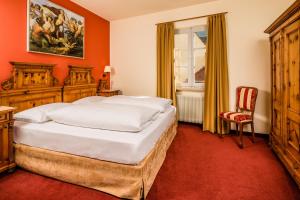 Postel nebo postele na pokoji v ubytování Hotel Traube