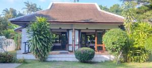 a small house with a brown roof at EASY TIME VILLA by MARALEINA in Koh Samui