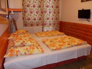 Postel nebo postele na pokoji v ubytování Puszta Hotel