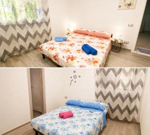 a bedroom with two beds with pillows on it at Stella Marys Nord in Olbia