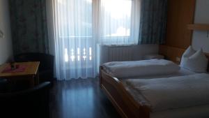 Postel nebo postele na pokoji v ubytování Gästehaus Klug