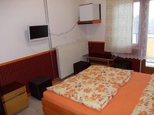 Postel nebo postele na pokoji v ubytování Puszta Hotel