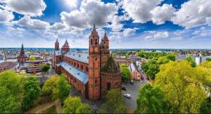 an aerial view of an old building with a tower at Luxe Apartment am Rhein in Worms