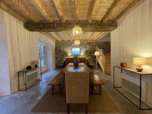 a living room with a table and a couch at Artekoborda in Souraïde