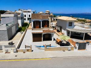 an aerial view of a house with the ocean at 045 Casa Embat ETV10796 by Mallorca Charme in Son Serra de Marina