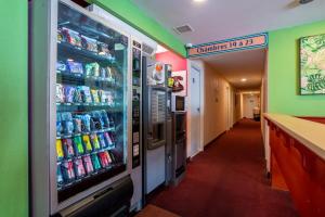 a drink refrigerator in a fast food restaurant at Quick Palace St Jean De Vedas - A709 in Saint-Jean-de-Védas