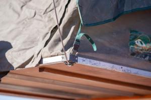 a rope is hanging from the inside of a tent at Kalahari Anib Campsite in Hardap +2 photos