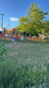 a park with a playground with a play structure at Hospitality M7 in Kallithea Halkidikis