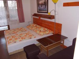 Postel nebo postele na pokoji v ubytování Puszta Hotel