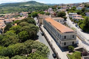 an aerial view of a town with a building at Casa Orizzonte Anglona in Nulvi