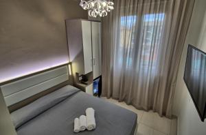 Postel nebo postele na pokoji v ubytování GFH - Hotel Sole Resort & Spa