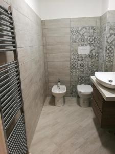 Ванная комната в La Rosa Del Garda Apartment