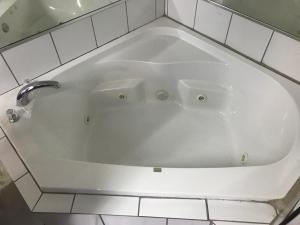Koupelna v ubytování Mayfair Motel