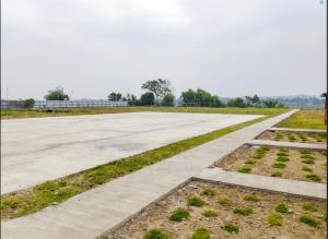 an empty runway at an airport at Villa Cedes in Lasam +2 photos