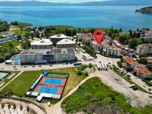 an aerial view of a resort with a red balloon at Villa Apollo Ohrid Lakeside in Ohrid