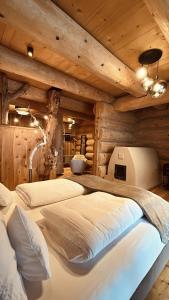 Säng eller sängar i ett rum på Boutique Hotel Pradell