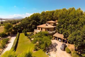 an aerial view of a house with a car parked in front at Chambres D'hôtes - Le Mas Du Rocher in Hyères