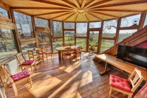 a large room with a table and chairs at Haus Habbinga in Ovelgönne +7 photos