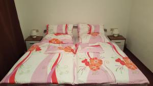 
Ein Bett oder Betten in einem Zimmer der Unterkunft Tivoli

