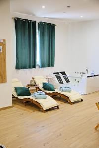 a room with several mattresses sitting on the floor at RG MAISON - Suite 29 in Morino