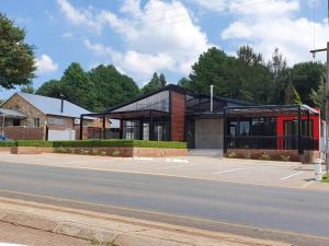 a building on the side of a street at Sleep84 in Dullstroom