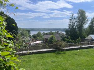 a house on a hill with a view of the water at Black Isle View in Dingwall