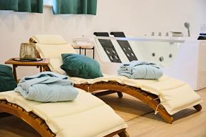 a room with two chairs with towels on them at RG MAISON - Suite 29 in Morino
