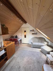 a living room with a couch and a table at Cozy Apartment in Wülfrath