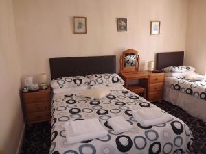 Postel nebo postele na pokoji v ubytování Glenavon Homestay