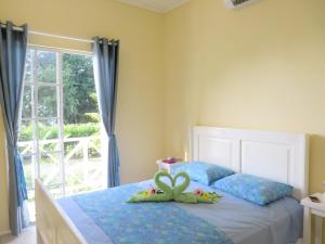 Posteľ alebo postele v izbe v ubytovaní Sunhill Villa