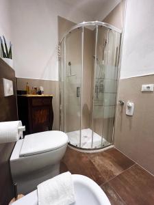 a bathroom with a shower and a toilet at Camera con Vista in Cervia +29 photos