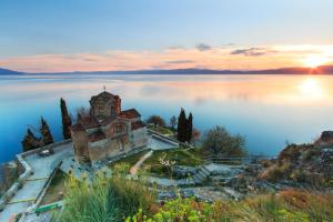 an island in the middle of a body of water at Central Apartments Kukoski Near Lake & Old Town in Ohrid