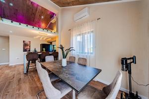 a dining room with a table and chairs at Villa Anita in Vela Luka