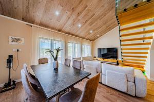 a dining room with a table and chairs at Villa Anita in Vela Luka