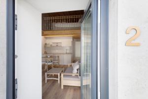 a view of a dining room and kitchen from a window at Vila Santa Luzia 2 in Fátima