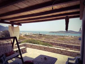 a view of the ocean from the balcony of a house at Cycladic residence, Saint George, Antiparos in Agios Georgios