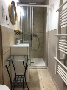 a bathroom with a sink and a shower at Clos Sainte Marguerite in Lambesc +18 photos