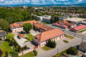 an aerial view of a town with buildings at Hotel Novy Kastiel - Self check-in in Topoľčany