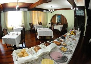 ห้องอาหารหรือที่รับประทานอาหารของ Pigatto Hotel