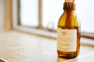 a bottle of cannabis oil sitting on a table at Whitby Old Town Stay, Sleeps 4, The Nest in Whitby +13 photos