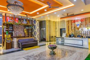 a lobby of a hotel with a bar at Hotel Ashirbad I comfort Near Railway Station in Bhubaneshwar