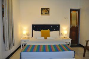 Postel nebo postele na pokoji v ubytování Villa 92 City Stay