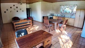 an overhead view of a kitchen with a table and chairs at Emmanuel Self-Catering Cottage in Thabazimbi