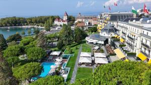 an aerial view of a city with a resort at Beau-Rivage Palace in Lausanne