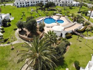 an aerial view of a resort with a swimming pool at Sunset Haven Algarve in Albufeira