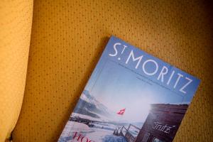 a book with the words shock and money sitting on a table at TH Samedan - Hotel Bernina 1865 in Samedan